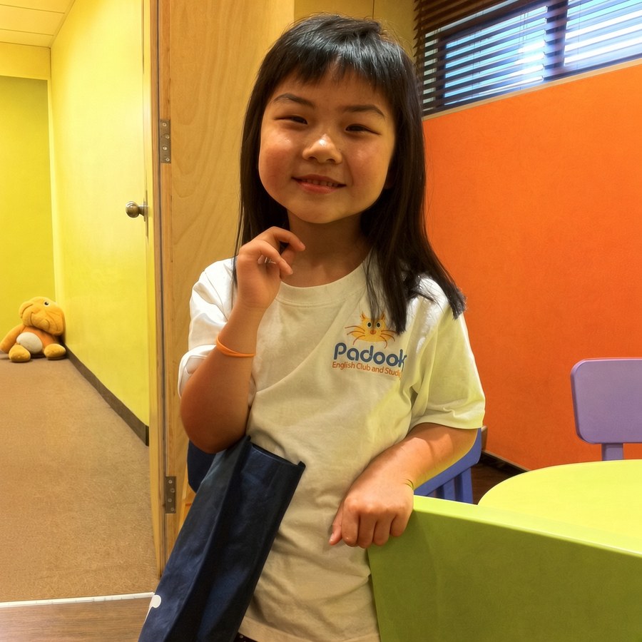 Student smiling after lesson progress
